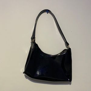 Black latex hand bag